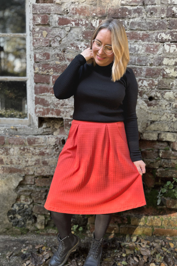 Oranssi Armi-neuloshame koossa M/L.